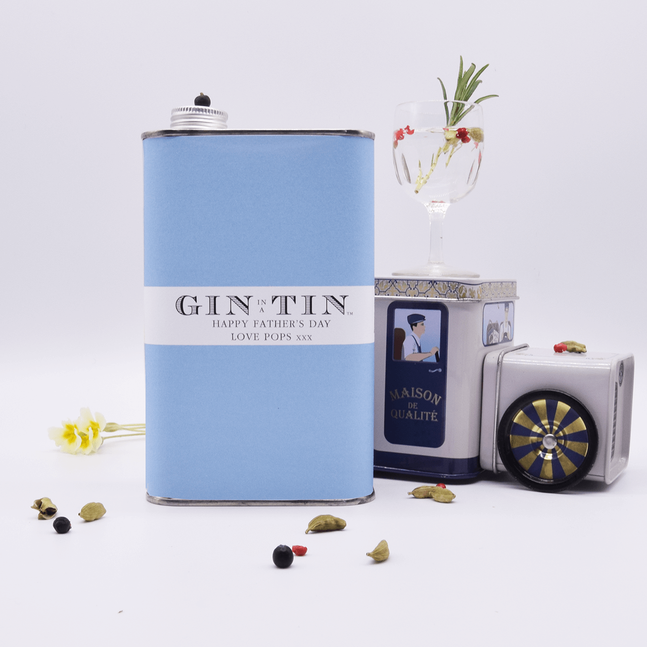 A PERSONALISED BLUE TIN OF GIN