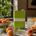 A 50cl tin of 2026 Gin No. 9 London Dry gin featuring apricot, elderflower and orris root, presented as a still life product image.