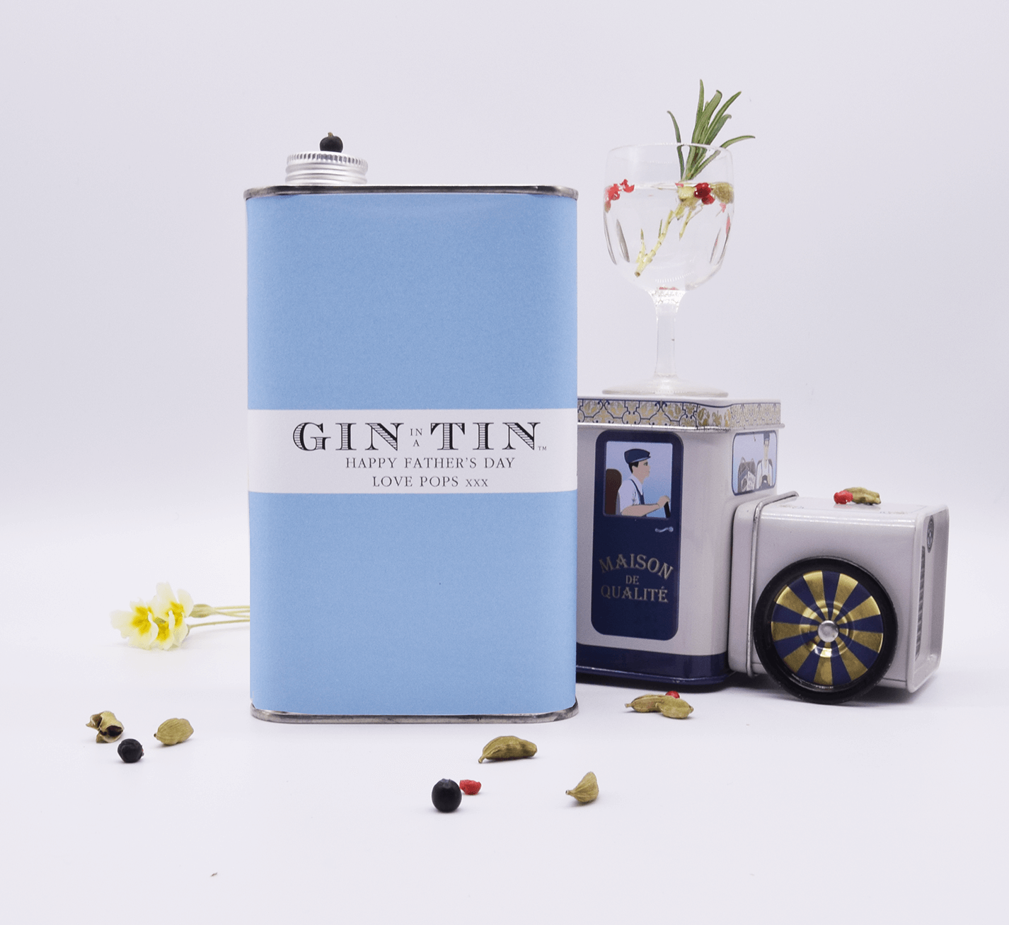 A PERSONALISED BLUE TIN OF GIN