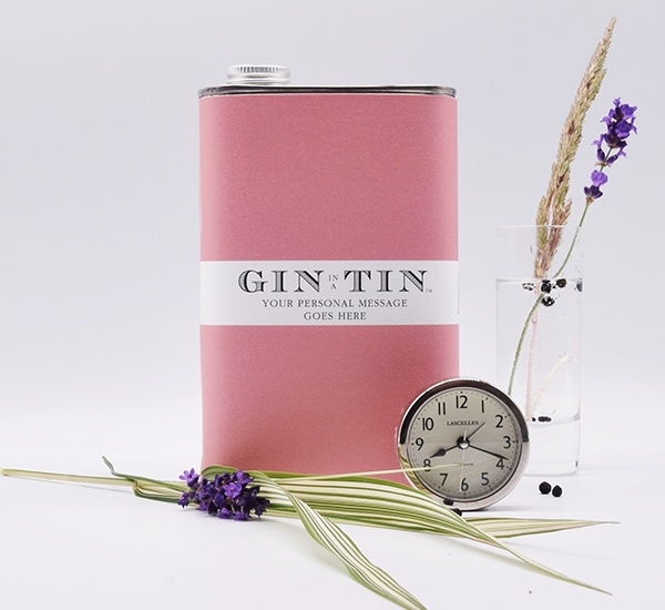 A PERSONALISED PINK TIN OF GIN